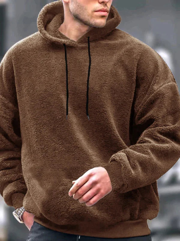 Man in an oversized brown teddy fleece pullover hoodie fashion image