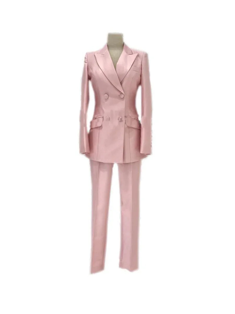 Pink double-breasted pantsuit with satin lapels on a mannequin fashion image